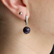 Load image into Gallery viewer, Amethyst orb earrings with silver clasps.