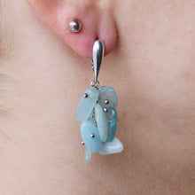 Load image into Gallery viewer, Collection of Aquamarine stone dangling earrings with silver clasps.