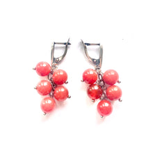 Load image into Gallery viewer, Carnelian earrings with brownish-red stones and silver hooks. 