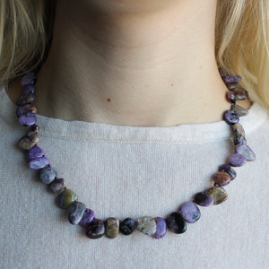 Lilac Charoite stone necklace.