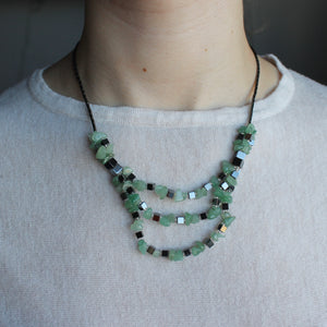 Hematite and green Agate stone necklace with three layers.