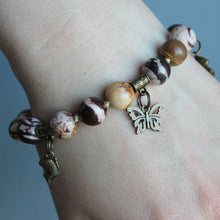 Load image into Gallery viewer, Brown Jasper stone bracelet with gold charms 