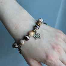 Load image into Gallery viewer, Brown Jasper stone bracelet with gold charms 