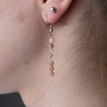 Load image into Gallery viewer, Pink Moonstone earrings with silver hooks.