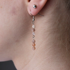 Pink Moonstone earrings with silver hooks.