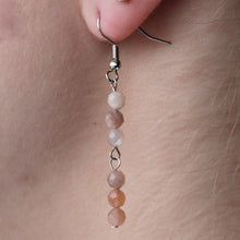 Load image into Gallery viewer, Pink Moonstone earrings with silver hooks.