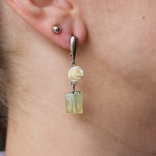 Load image into Gallery viewer, Light green Prehnite stone dangle earrings with white rose ornaments and silver clasps.