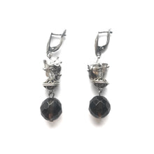 Load image into Gallery viewer, Purple Topaz orb dangling earrings with silver ornament and clasps.