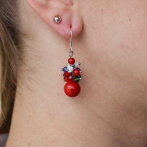 Coral "Vyshyvanka" dangle earrings with blue, white, and green stones and genuine silver hooks.